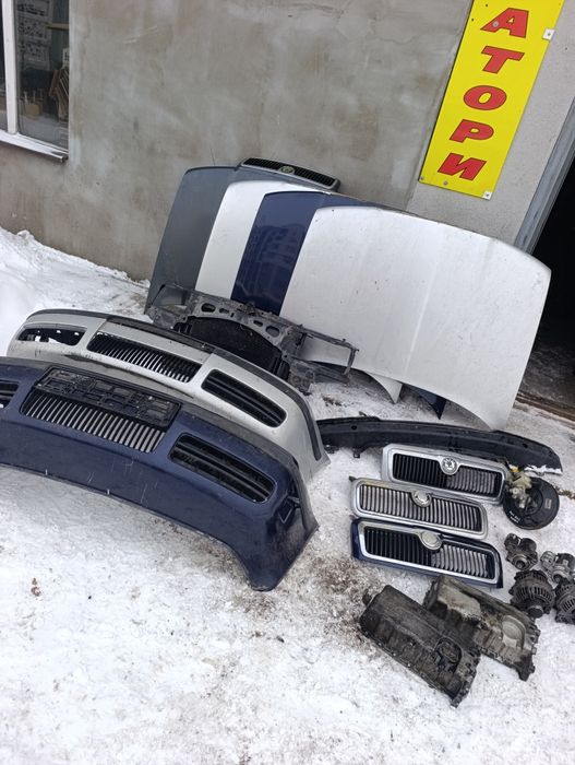 Бампер решітка Шкода Октавія тур оригінал капот