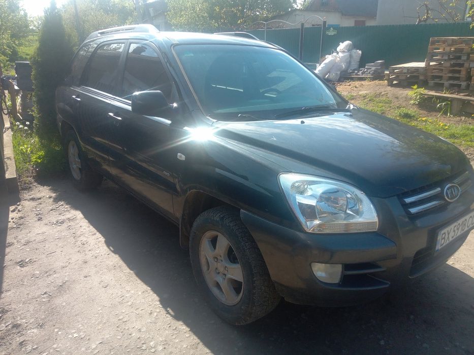 Кіа спортедж 2.0газ бензин