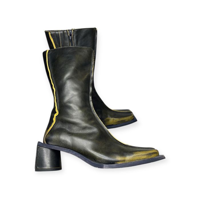 Шкіряні чоботи бренда Miista.