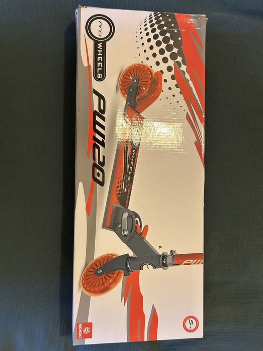 Trotinete Nova na caixa e selada