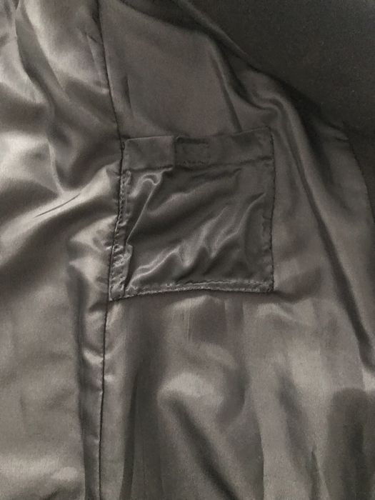 Casaco comprido de fazenda