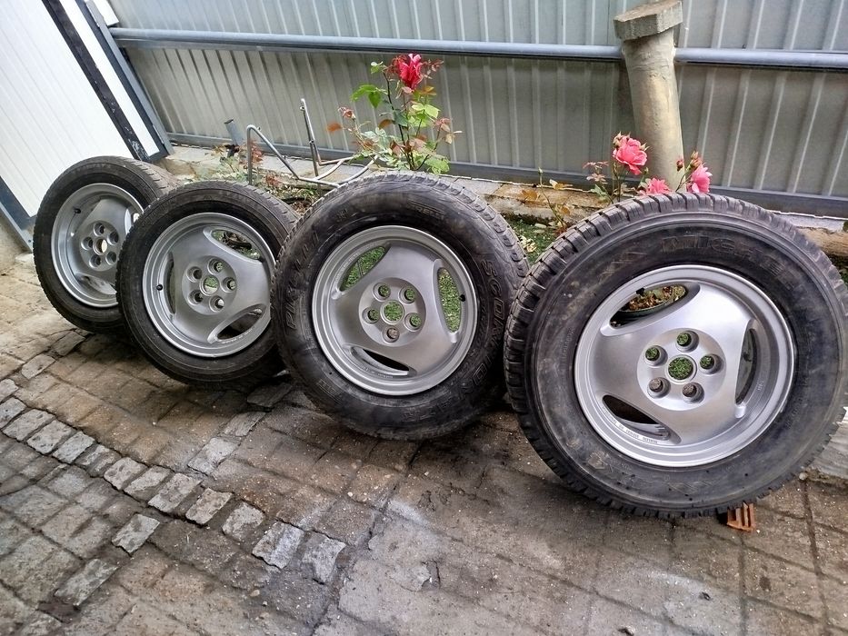 4 Jantes com pneus usados Discovery TD5 ou Range Rover P38 5X120