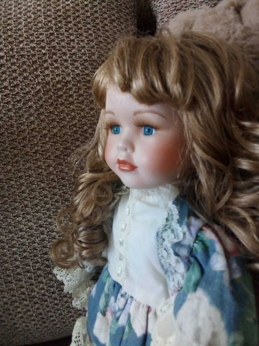 Lalka porcelanowa Leonardo