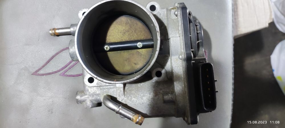 Дроссельная заслонка