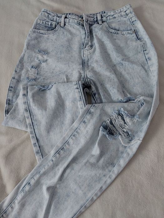 Spodnie jeansowe M x dziurami