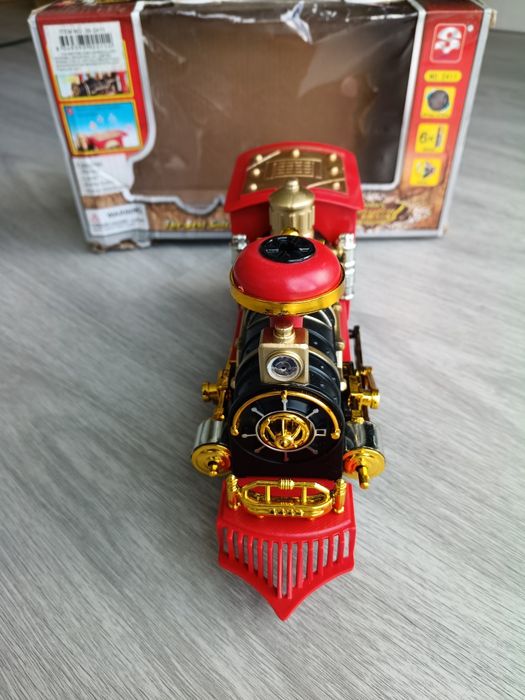 Locomotiva brinquedo com luz, som e movimento