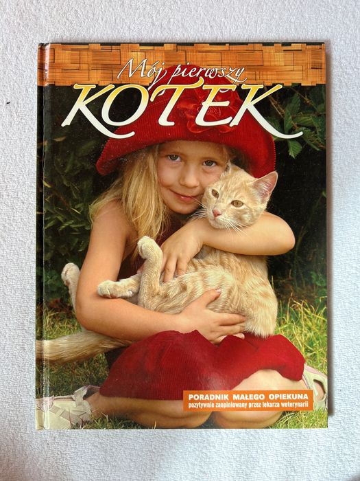 Encyklopedja zwierząt. Psy i szczenięta. Pierwszy Kotek