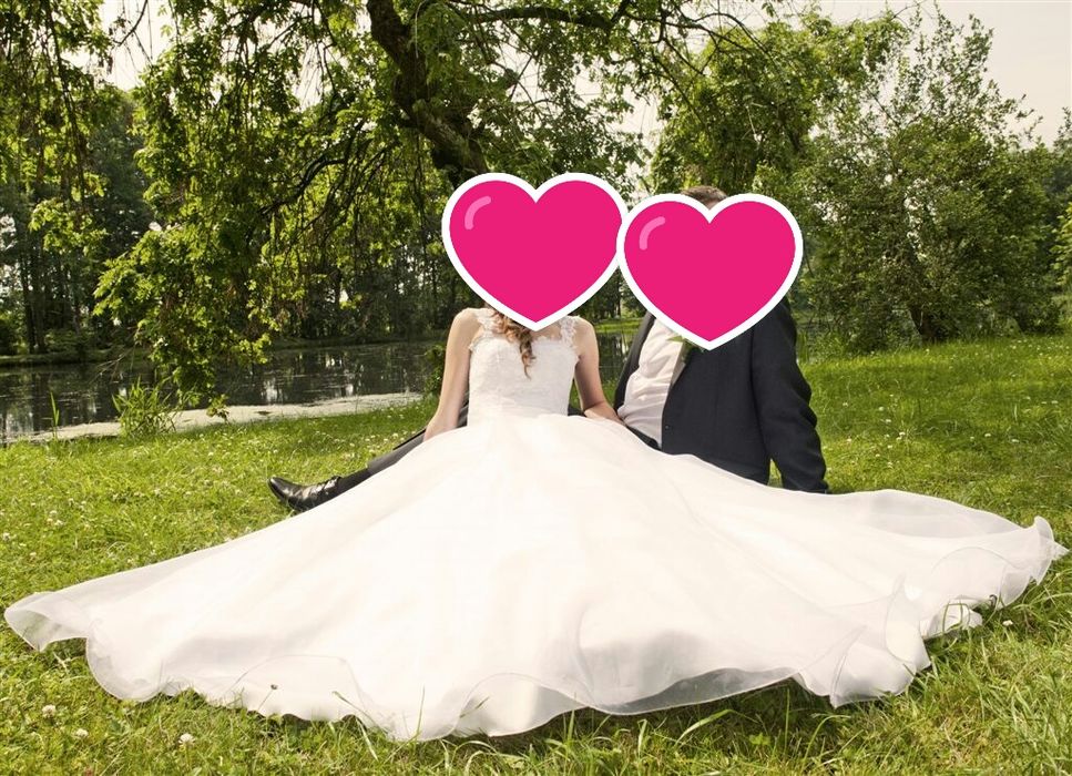Suknia ślubna z trenem i welonem