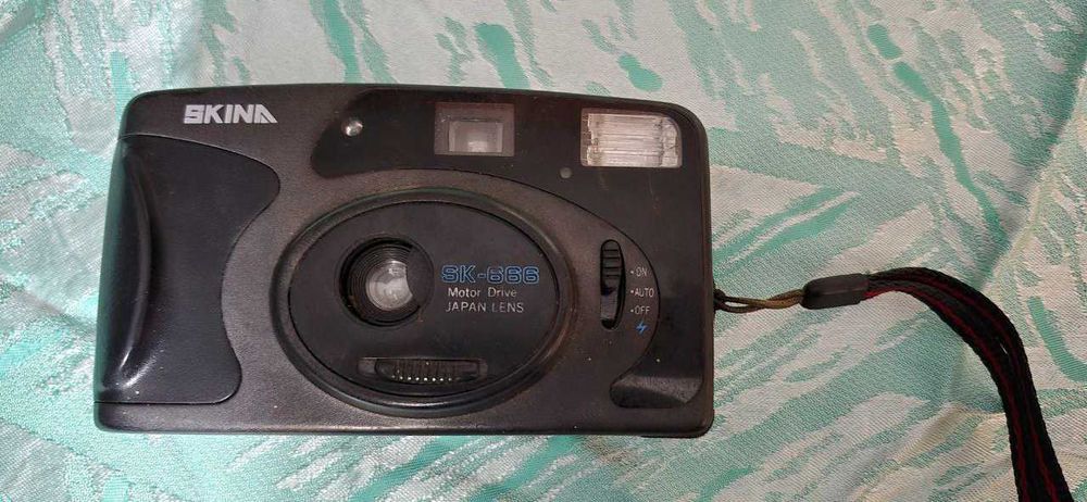 Фотоаппараты Canon,  Skina