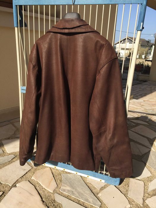 Casaco em pele castanho