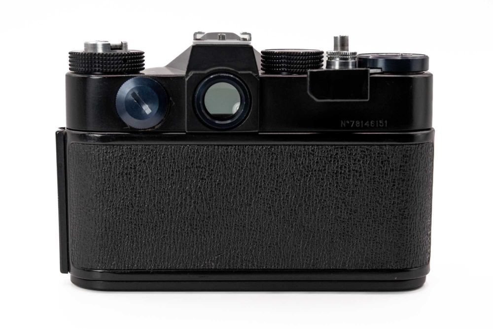 Máquina analógica Zenit TTL com objetiva Helios 2.0