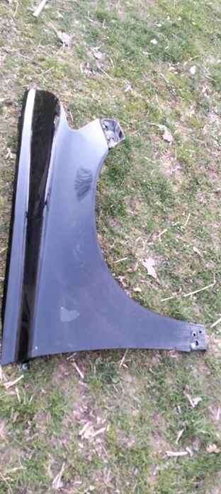 Blotnik przedni prawy Volvo V50 S40 czarny