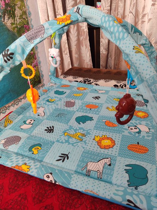 Коврик розвиваючий з дугами