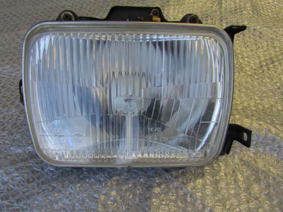 Farol (otica ) Opel Campo , original (ver descrição)