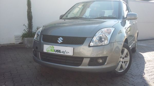 Mola de suspensão frente esquerda SUZUKI Swift III (MZ, EZ)