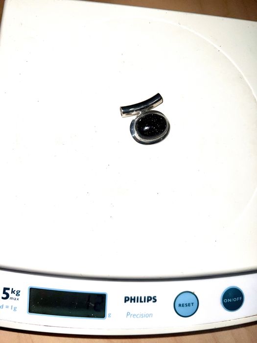 Pendente em prata e pedra onix