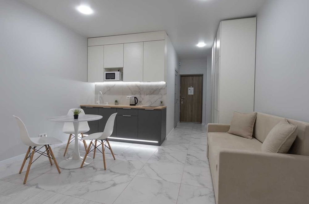 Завжди є світло! Затишна студія з панорамним видом на місто.