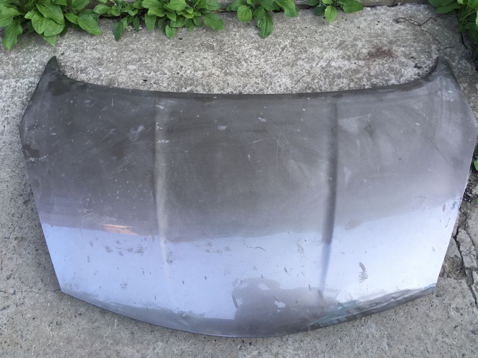 Капот на nissan note 2009