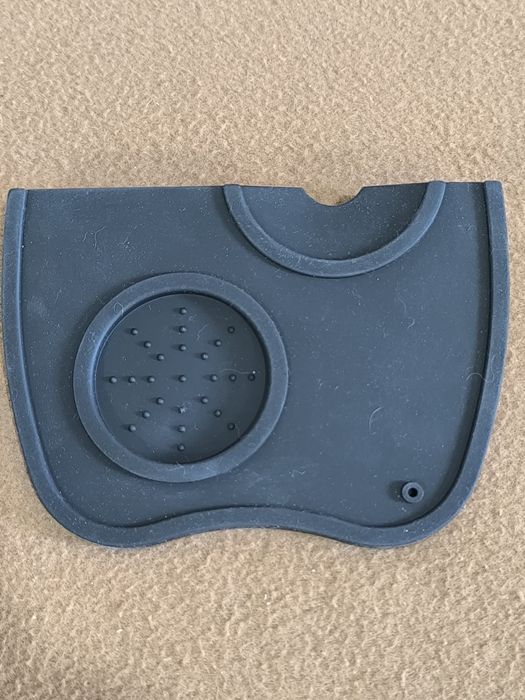 Tapete para compactação de café