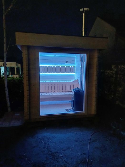 Sauna zewnętrzna z witryną piec harvia na drewno ,kamienie balik 58 mm