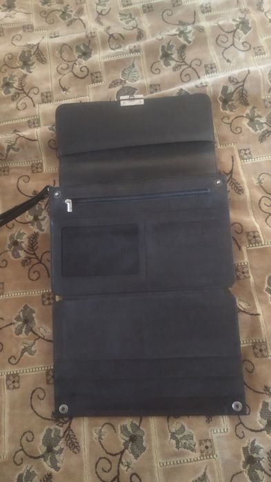 Чоловіча барсетка.