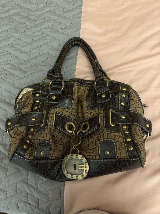 Mala vintage da guess de a muitos anos mas perfeita e nova