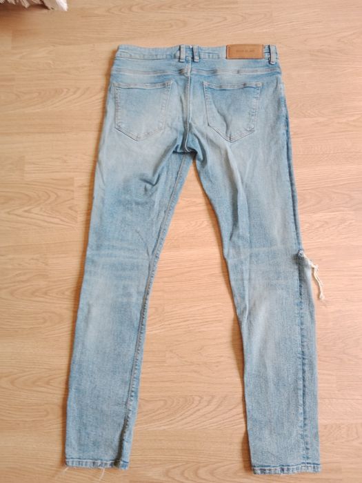 Jeansy Męskie River Island z Przetarciami