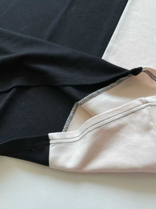 Bonprix Bodyflirt sukienka trapezowa z golfem czarna kremowa półgolfem