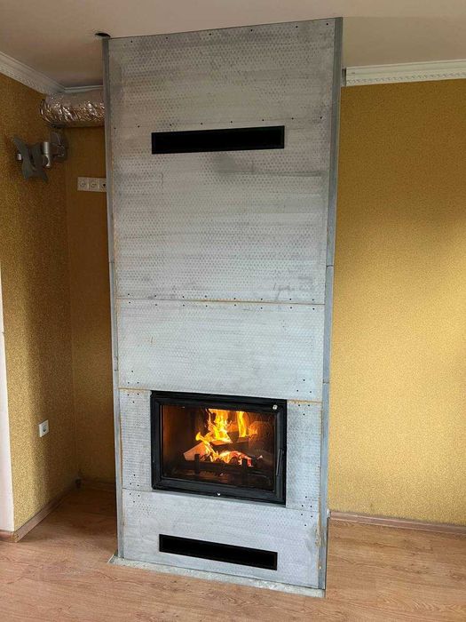 Якісний монтаж каміна з обігрівом на будинок