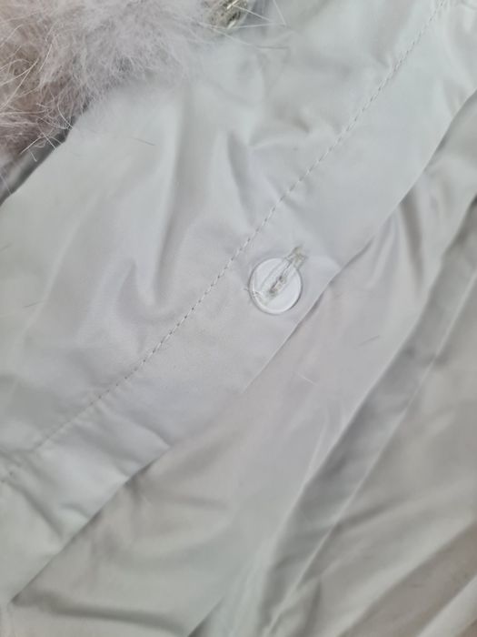 Женский пуховик с мехом