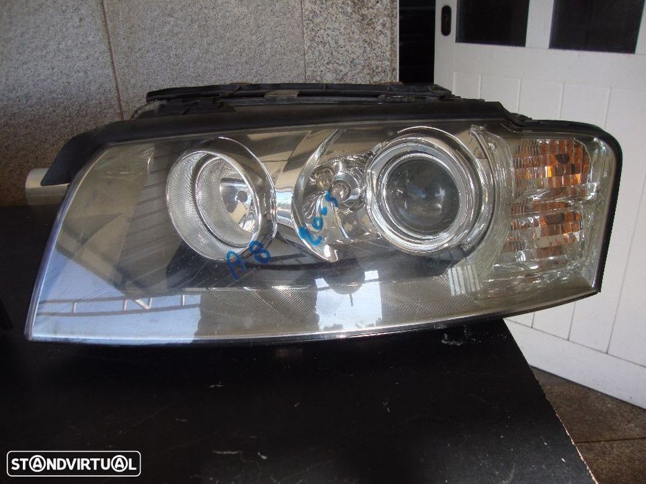farois xenon direcionais Audi A8  pre-facelift grelha pequena