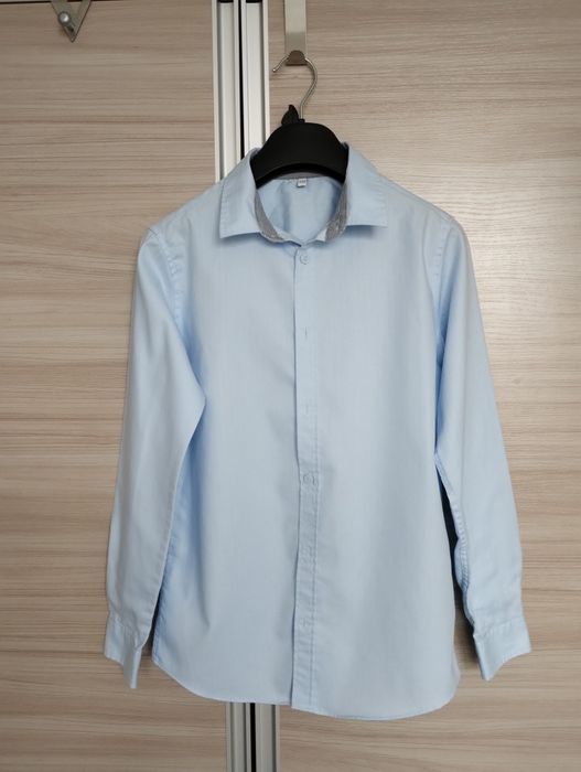 Niebieska elegancka koszula dla chłopca rozmiar 152