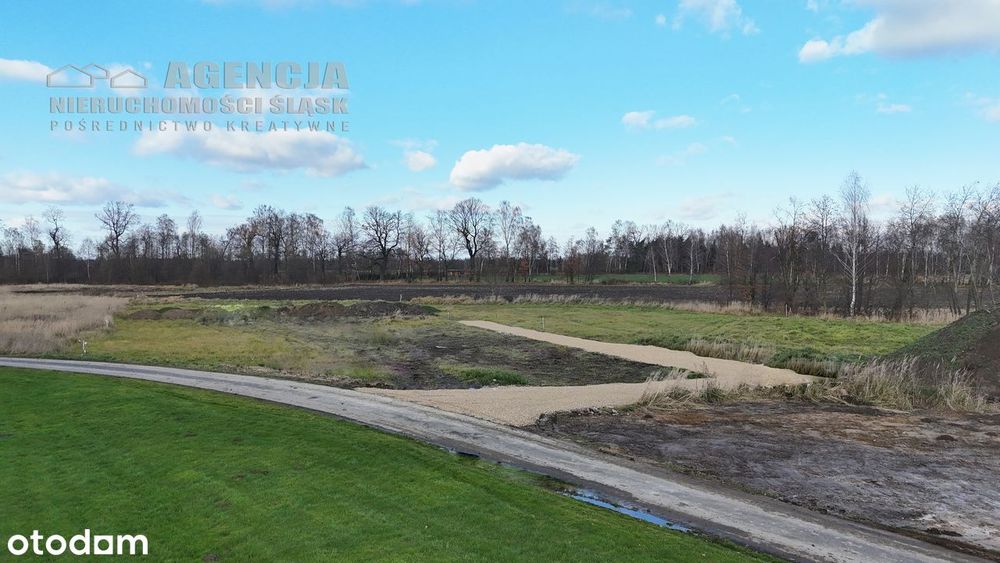 Działki budowlane w otoczeniu terenów zieleni, gotowa droga wewn