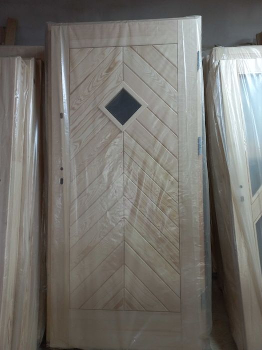 Drzwi drewniane wejściowe Góralskie kute