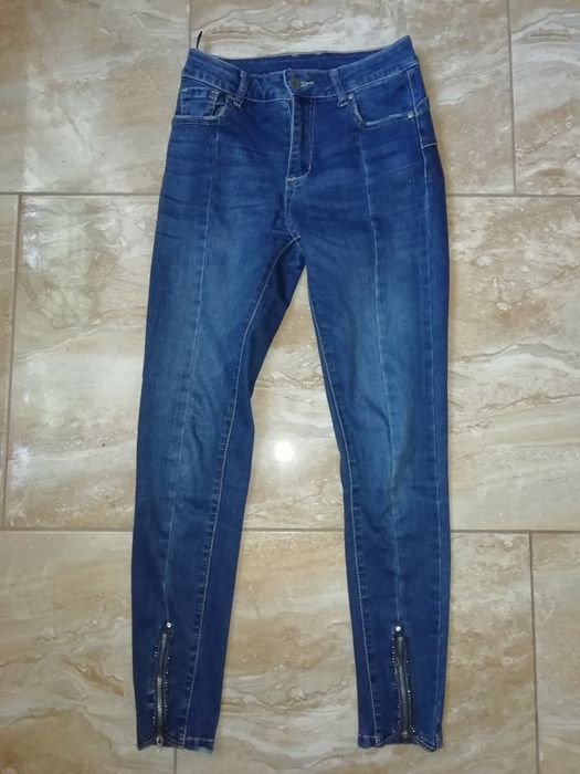 Spodnie jeans rurki zamki 36