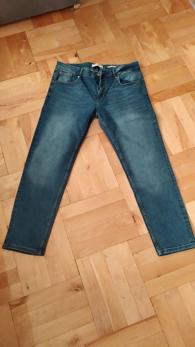 Męskie spodnie dżinsowe RESERVED 34/32 SLIM