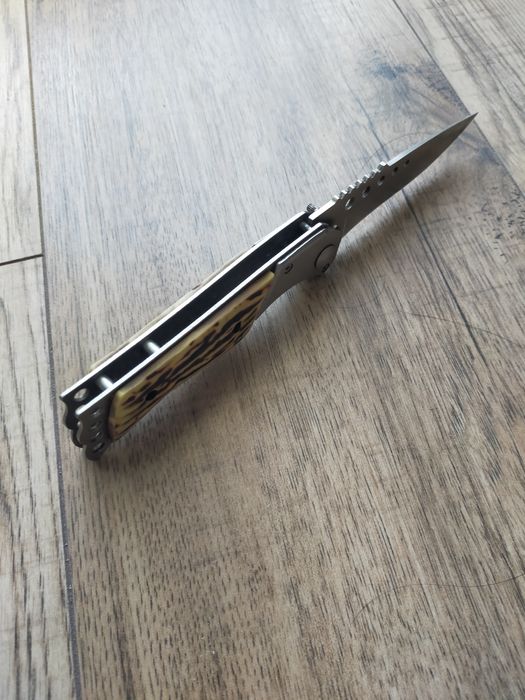 Nóż sprężynowy, składany