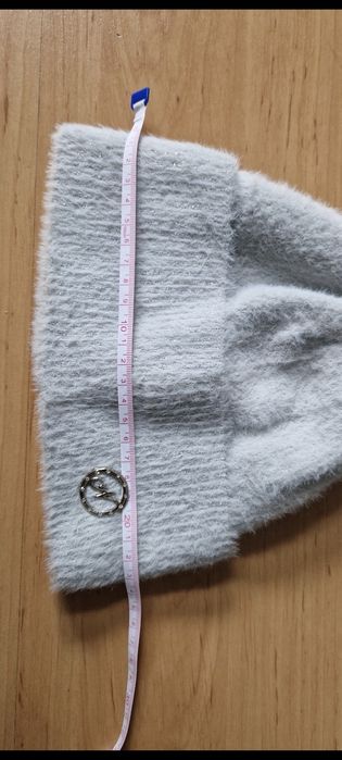 Modna zimowa czapka marki NowMark z pomponem