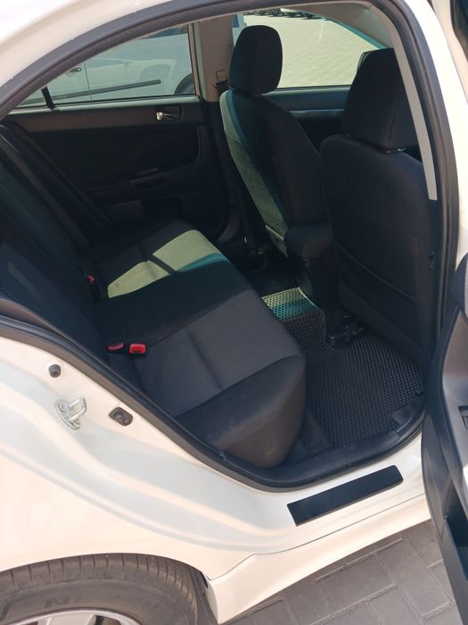 Mitsubishi Lancer 2009 VIN JMBLTCX3A9U002885 фото оголошення 9 з 18
