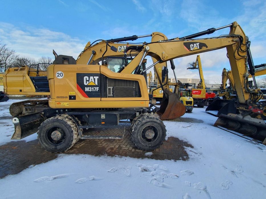 Koparka kołowa Caterpillar Cat M317F (315, 317)