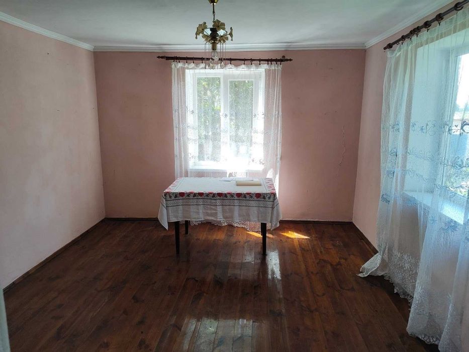 Житловий будинок та земельна ділянка 35 сот., с. Мальчиці