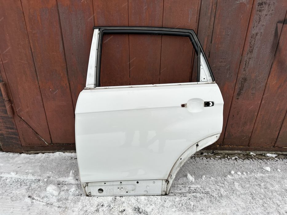 Дверка двері кляпа Chevrolet Captiva