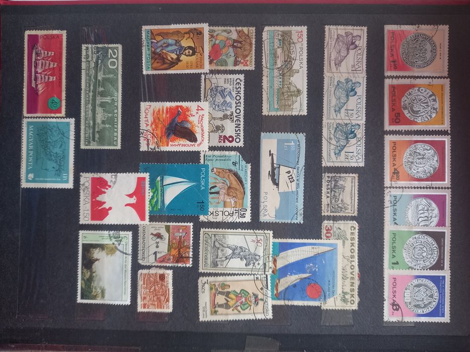 Колекція марок, в альбомі та чохлі до нього.