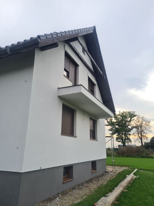 tynkowanie elewacji natryskowe tradycyjne termin na  rok 2025