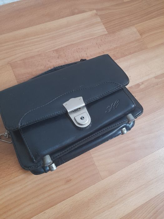 Шкіряні чоловічі сумки/клатчі