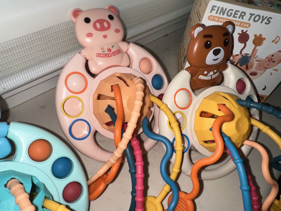 Zabawka Montessori. Przeciąganie. Gryzak