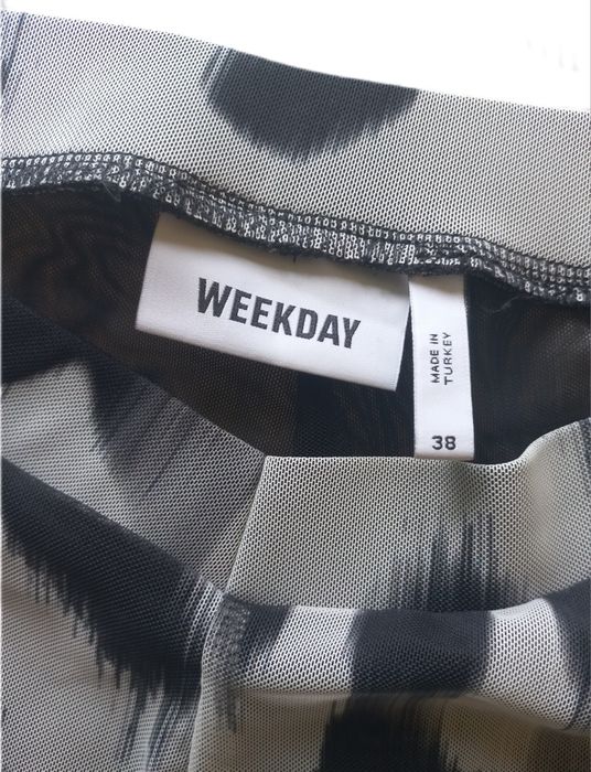 брюки кльош в сіточку Weekday