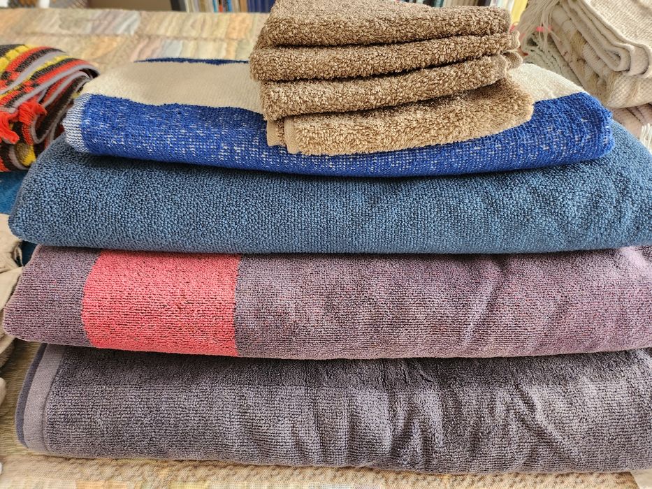 Roupa de cama, toalhas e tapetes