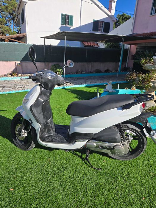 Mota peugeot 125  impecavel