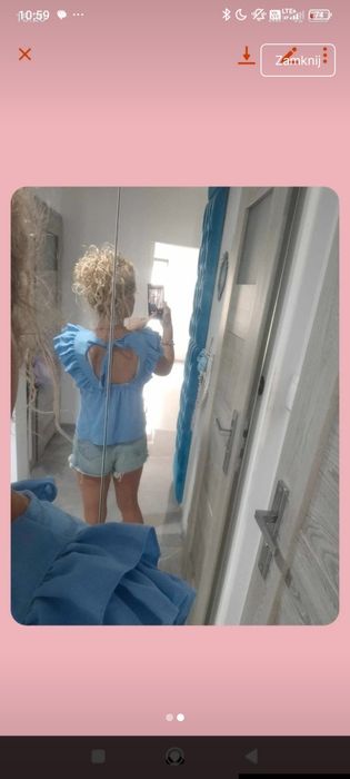 Niebieska bluzeczka idealna na elegancko jak i sportowo